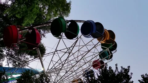 Multi colored ferris wheel at twilight Stock Footage 281511052