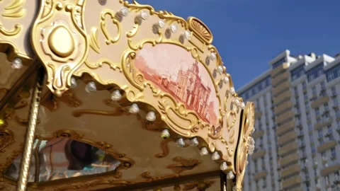 Multi-colored festive carousel, attraction, merry-go-round roundabout is Stockbeeldmateriaal 218607263