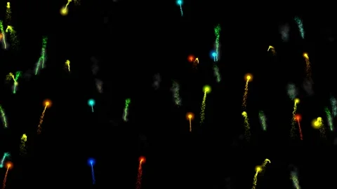 Multi-colored firecrackers soar up against a black background, explode and fall Stock Footage 156311597