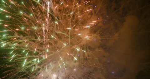 Multi Colored Fireworks Display at Summer Event with Rocket Trails and Strobes Stock Footage 111983025