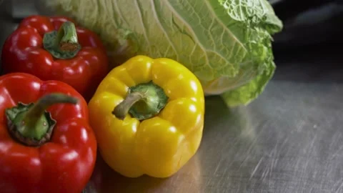 Multi colored fresh vegetables: cabbage, bell peppers. Stock Footage 190870603