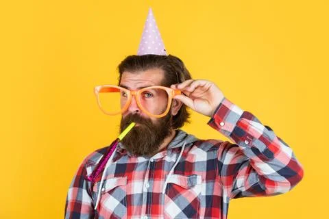 Multi colored fun. best party for retirement. cheerful man with beard and 스톡 사진