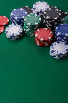 Multi colored gaming chips for betting in casino games. Betting chips Stock Photos