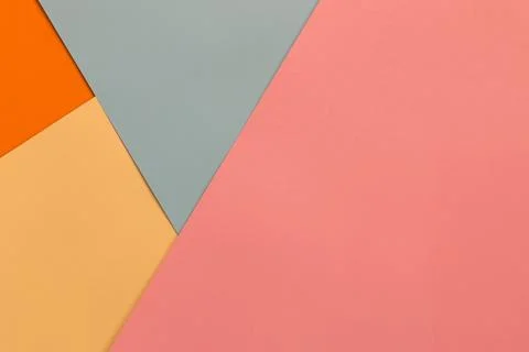 Multi-colored geometric background from colored cardboard Stock Photos