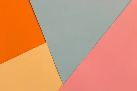 Multi-colored geometric background from colored cardboard Stock Photos
