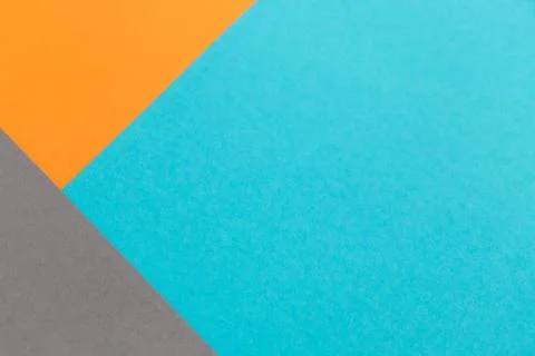 Multi-colored geometric background from colored cardboard Stock Photos