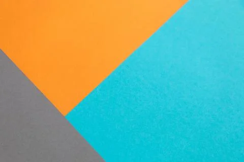 Multi-colored geometric background from colored cardboard Stock Photos