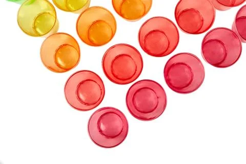 Multi-colored glasses for alcohol close-up. Caring for the environment. Stock Photos