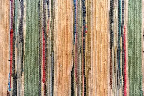 Multi-colored hand-made carpet from fabric. Stock Photos