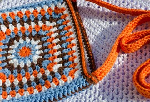 Multi-colored handbag on a light background. Foto stock