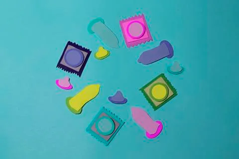 Multi-colored handmade mock-ups of condoms were cut out of colored paper Stock-Illustration