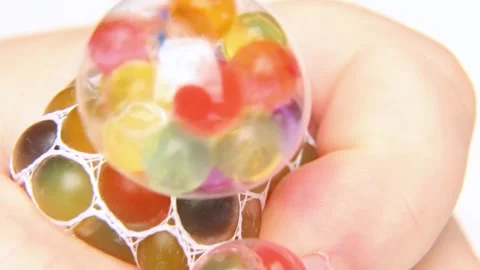 Multi-colored helium balloons for anti-stress therapy. Video stock 252495941