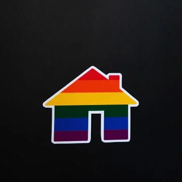 Multi-colored house on a black background, lgbt Stock Photos