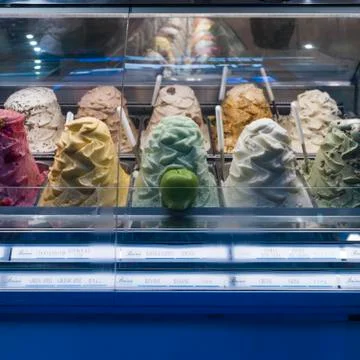 Multi colored ice cream in display cabinet, Siena, Tuscany, Italy Stock Photos