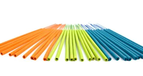 Multi-colored incense isolated on white background Stock Photos