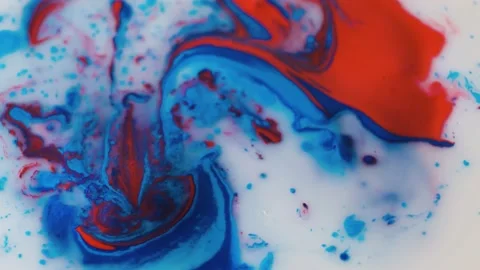 Multi-colored ink swirls under water and oil, creating colorful bubbles and Stock Footage 170303485