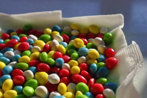 Multi-colored jelly beans sweets lit by the sun Stock-Fotos