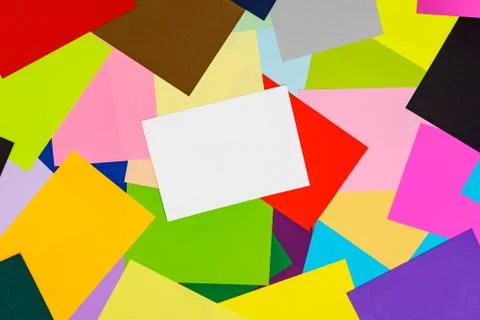 A multi-colored kaleidoscope of colored sheets of paper scattered chaotically in Stock Illustration