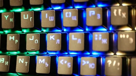 Multi-colored keyboard. The keyboard backlight shimmers in different colors. Wir Stock Footage 127749783