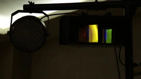 Multi-colored lamps flicker close-up. soffits shine in different colors Vídeo Stock 188897190