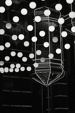 Multi-colored lanterns installation rise and fall against the background of a Stock Photos