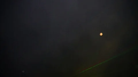 Multi-colored laser beams on a black background with smoke. Stock Footage 69903624