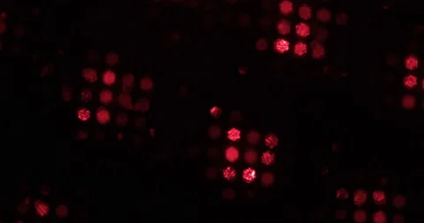 Multi-colored laser beams bokeh. Rotating red and green bokeh rays. Light effect Stock Footage
