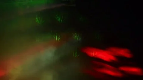 Multi-colored laser beams draw the pattern on the surface. Stock Footage 69306438