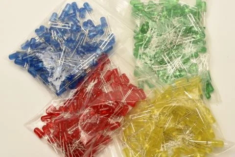 Multi-colored LEDs in bags. Electronic elements. Stock Photos