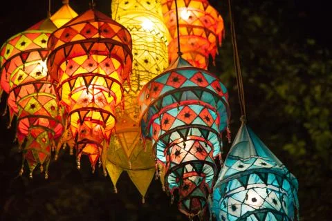 Multi-colored lights adorn the night beach of Ao Nang Stock Photos
