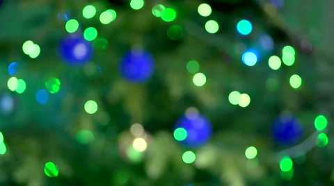 Multi-colored lights flashing on the Christmas tree. not in focus. Stock-Footage 55804853