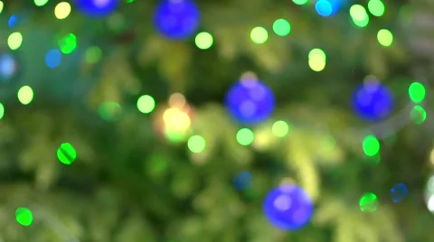 Multi-colored lights flashing on the Christmas tree. not in focus. Video stock 56687262