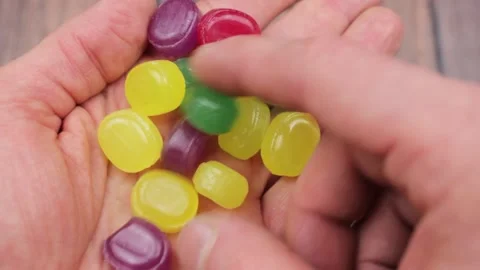 The Multi-colored lollipops. Lollipops close-up.  Natural caramel lozenges. Stock Footage 171927086