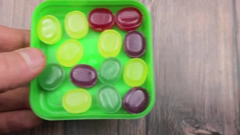The Multi-colored lollipops. Lollipops close-up.  Natural caramel lozenges. Stock Footage 171927238