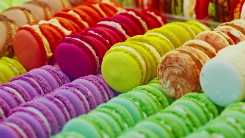 Multi-colored Macaroons sweet almond. French dessert delicious gourmet food Stock Footage 317586404