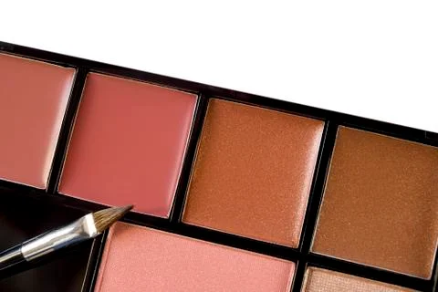 Multi colored make-up and brush Stock Photos