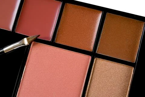 Multi colored make-up and brush Stock Photos