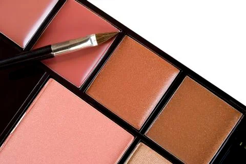 Multi colored make-up and brush Stock Photos