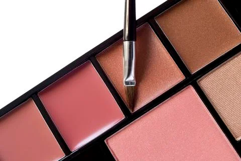 Multi colored make-up and brush Stock Photos