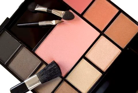 Multi colored make-up and brushes Stock Photos