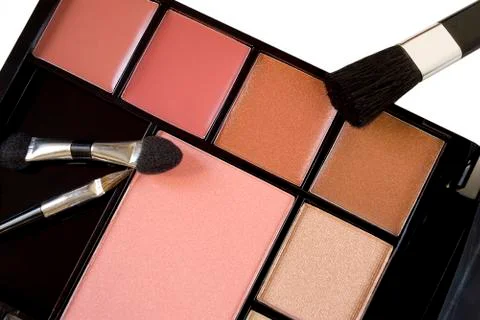 Multi colored make-up and brushes Stock Photos