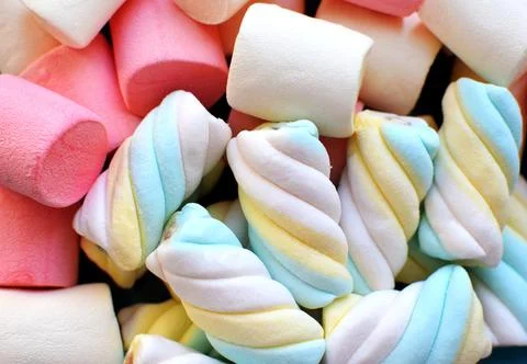 Multi-colored marshmallows. Background or texture of colorful pink and blue m Stock Photos