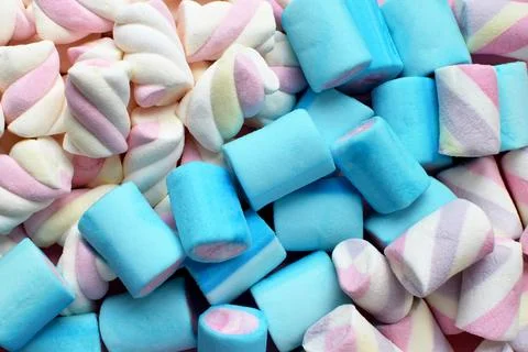 Multi-colored marshmallows. Background or texture of colorful blue and pink.. Stock Photos