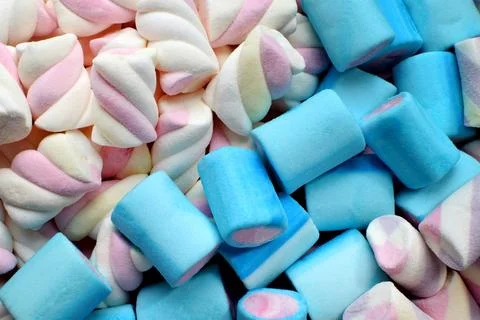 Multi-colored marshmallows. Background or texture of colorful blue and pink.. Stock Photos