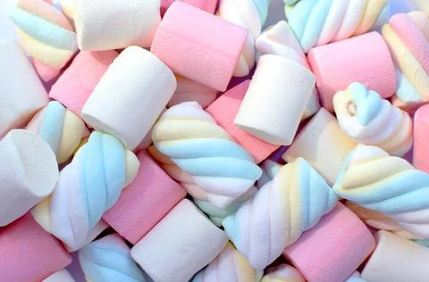 Multi-colored marshmallows. Top view. Background or texture of colorful blue Stock Photos