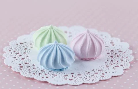 Multi-colored marshmallows on a white napkin. Stock Photos