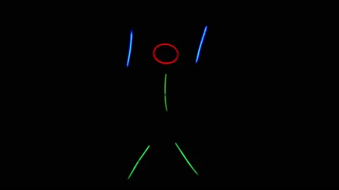 Multi-colored neon man raised his hands up and is shaking in the dark. Neon Stock Footage 146984299