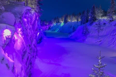 Multi-colored night illumination in the old Marble Canyon. Ruskeala Stock Photos