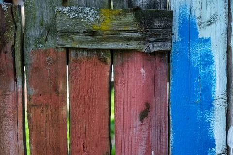 Multi-colored old fence. Stock Photos