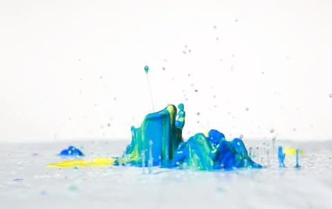 Multi colored paint splash Stock Photos